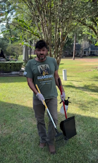 Adan working in a yard